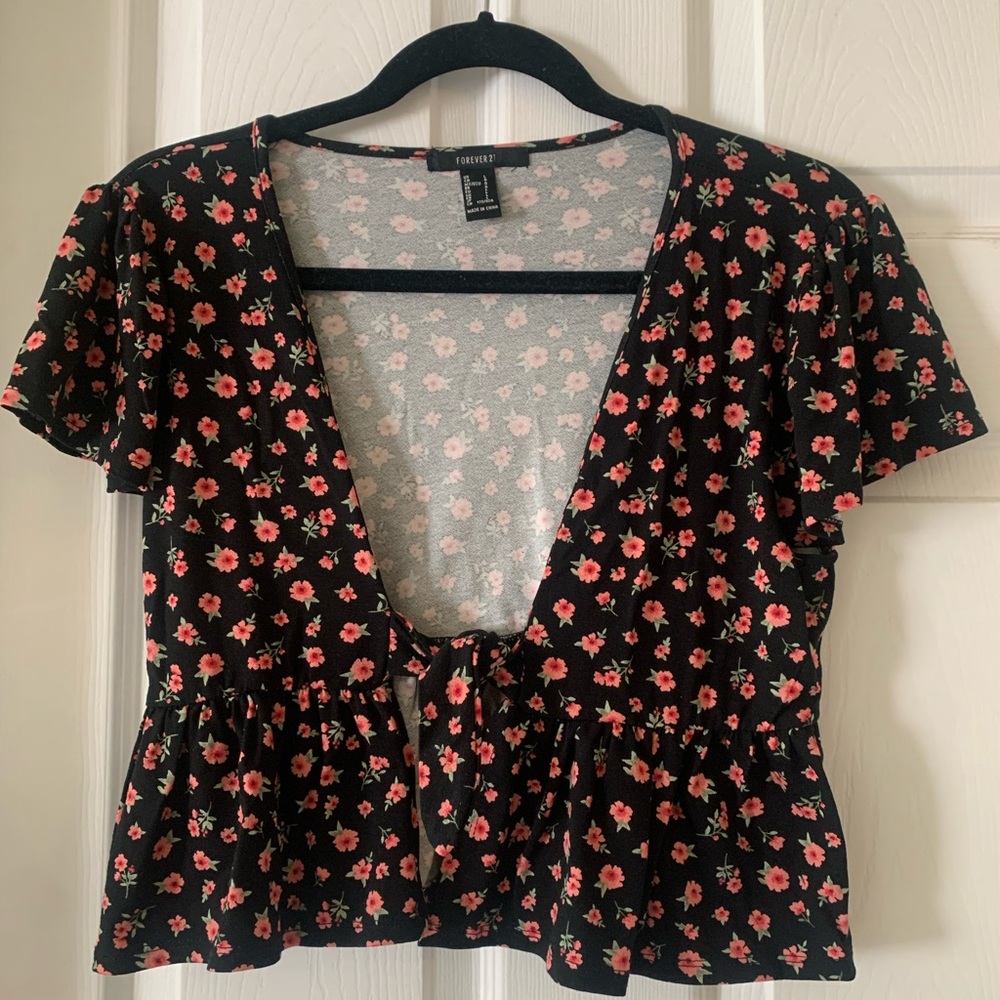 Cute cropped floral top perfect to layer over a tank top with jeans or dress.